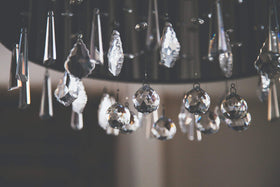 H&D Hyaline & Dora grid-shaped crystal pendant brightens curtains and shelves.