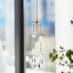 H&D HYALINE & DORA rainbow prism suncatcher on glass surface