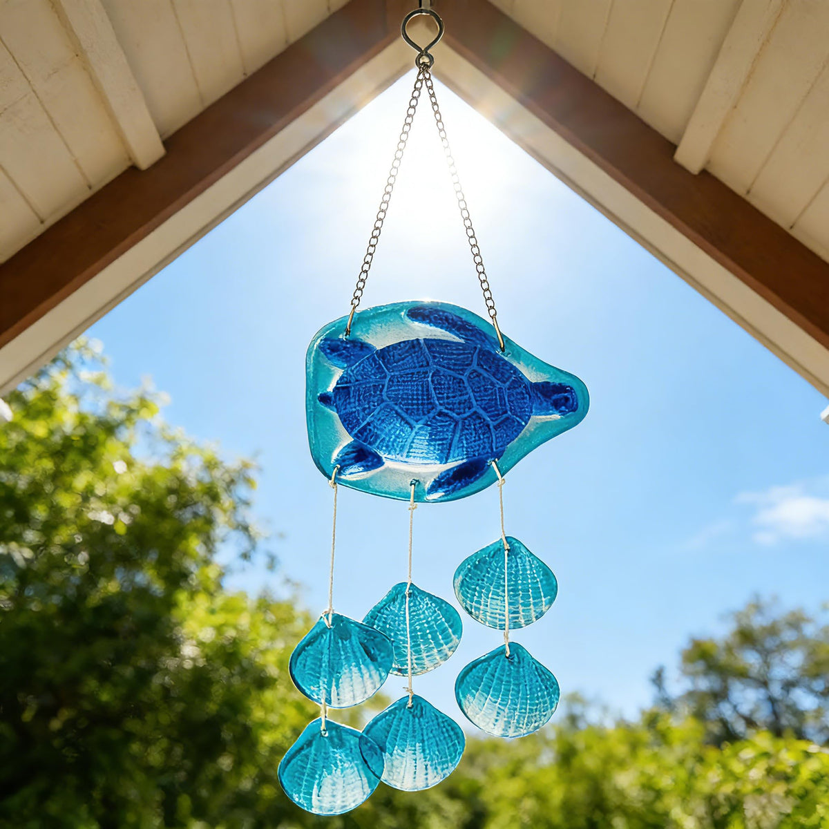 H&D Hyaline & Dora seashell-glass chime close-up highlights handcrafted details.