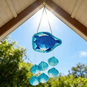 H&D Hyaline & Dora seashell-glass chime close-up highlights handcrafted details.