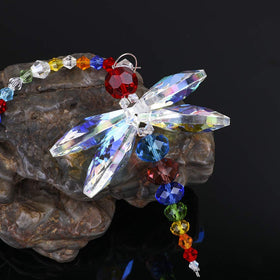 H&D HYALINE & DORA sun catcher dragonfly hanging beside a window dispersing light