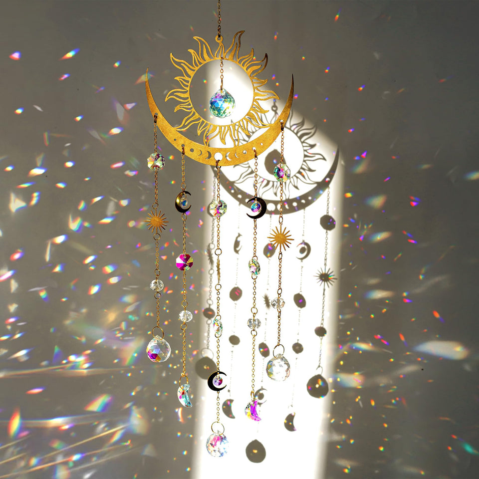 H&D Hyaline & Dora sun-moon suncatcher prisms casting vibrant rainbows in a sunny window