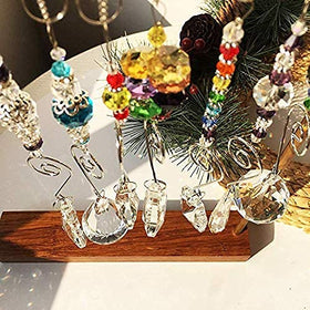 H&D Hyaline & Dora suncatcher reflection play across walls and ceilings.