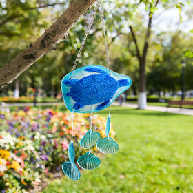 H&D Hyaline & Dora wind chime in sunlight enhances porch ambience with shimmer.