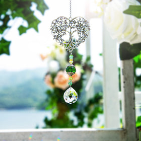 H&D Hyaline & Dora tree of life crystal ornament catches sunlight for shimmering reflections