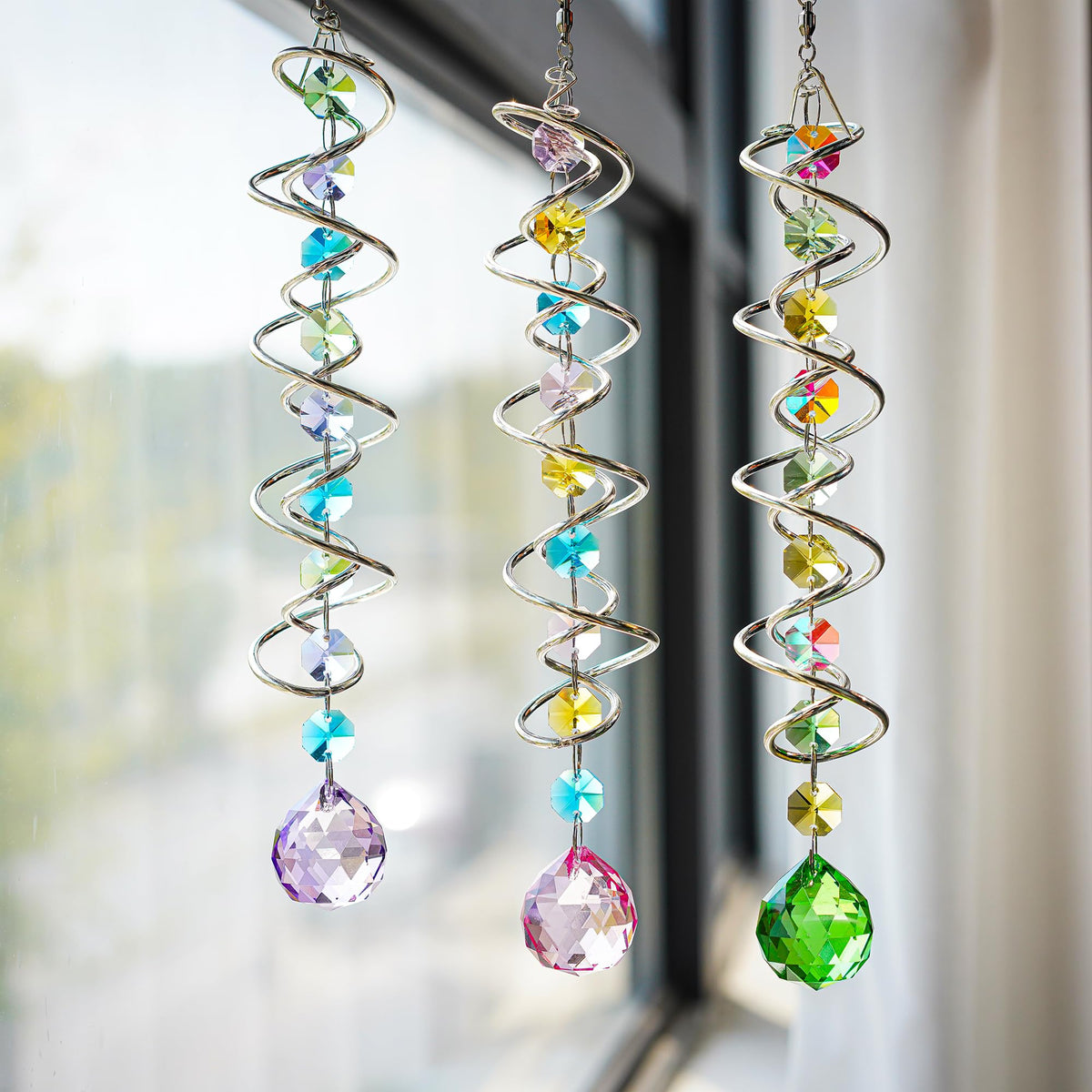 HD Hyaline & Dora wind spinner with octagon crystals reflects sunlight in outdoor spaces