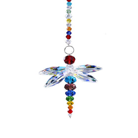 H&D HYALINE & DORA dragonfly crystal suncatcher catching sunlight to form rainbows