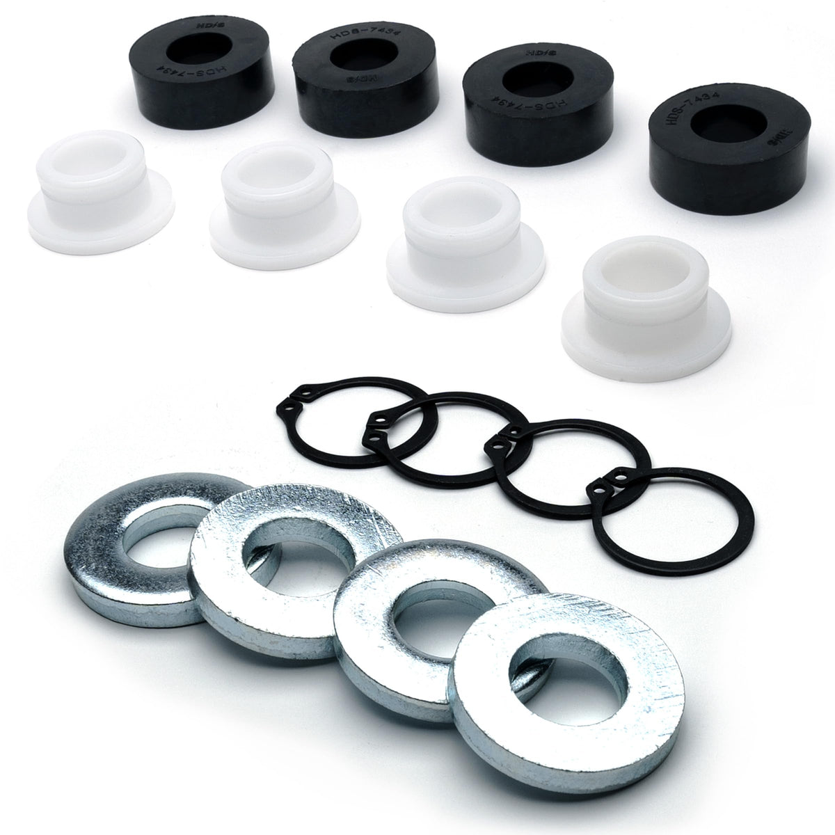 HD Switch deck-height kit components laid out for Walker mowers, ready for quick replacement