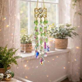 HDCRYSTALGIFTS 15.5-inch suncatcher casts shifting light across walls.