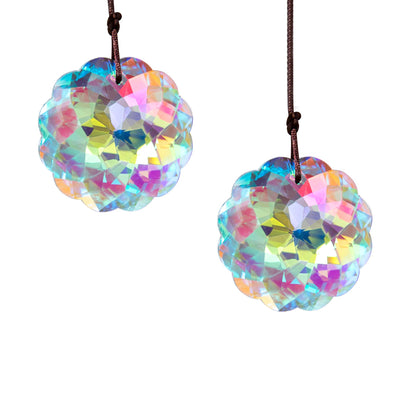 HDCRYSTALGIFTS Datura suncatcher by window casting vibrant rainbow light.