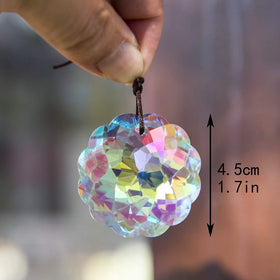 HDCRYSTALGIFTS Datura suncatcher outdoors scattering colorful specks.