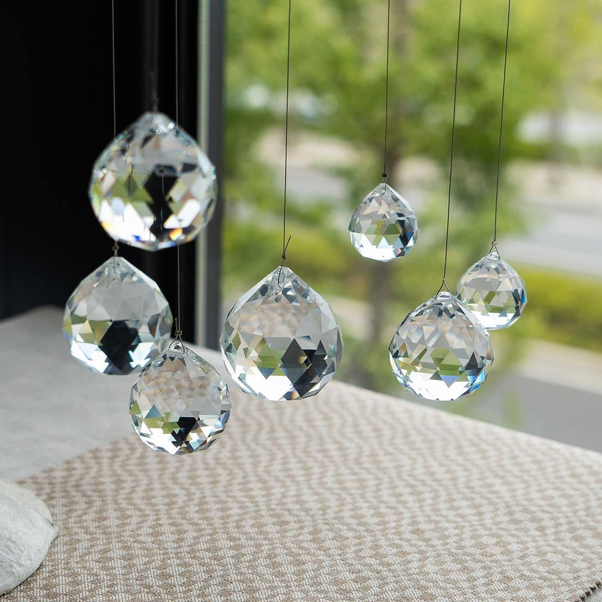 HDCRYSTALGIFTS hanging crystal prisms reflect sun for sparkling room accents.
