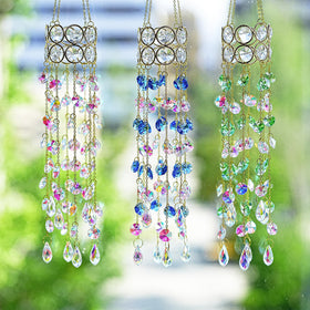 HDCRYSTALGIFTS 2-pack suncatcher hanging from a window enhances balcony decor.