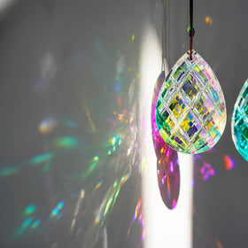 HDCRYSTALGIFTS 3-inch crystal prisms refract sunlight into vibrant rainbows