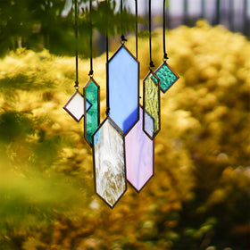 HDCRYSTALGIFTS window display in sunlight showcases blue modern art flair