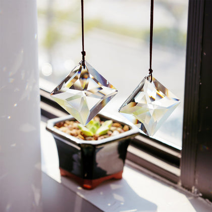 HDCRYSTALGIFTS clear sun catcher prism 50mm casting rainbows in sunlight.