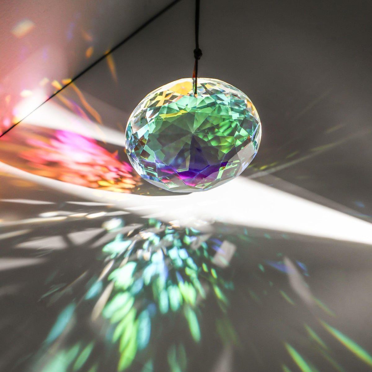 HDCRYSTALGIFTS sun catcher enhances indoor and outdoor window scenery.