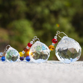 HDCRYSTALGIFTS crystal prisms brightening a window as decorative light accent