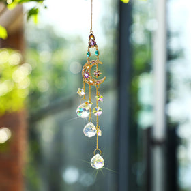 H&D Hyaline & Dora moon and star prisms add celestial ambiance to a room