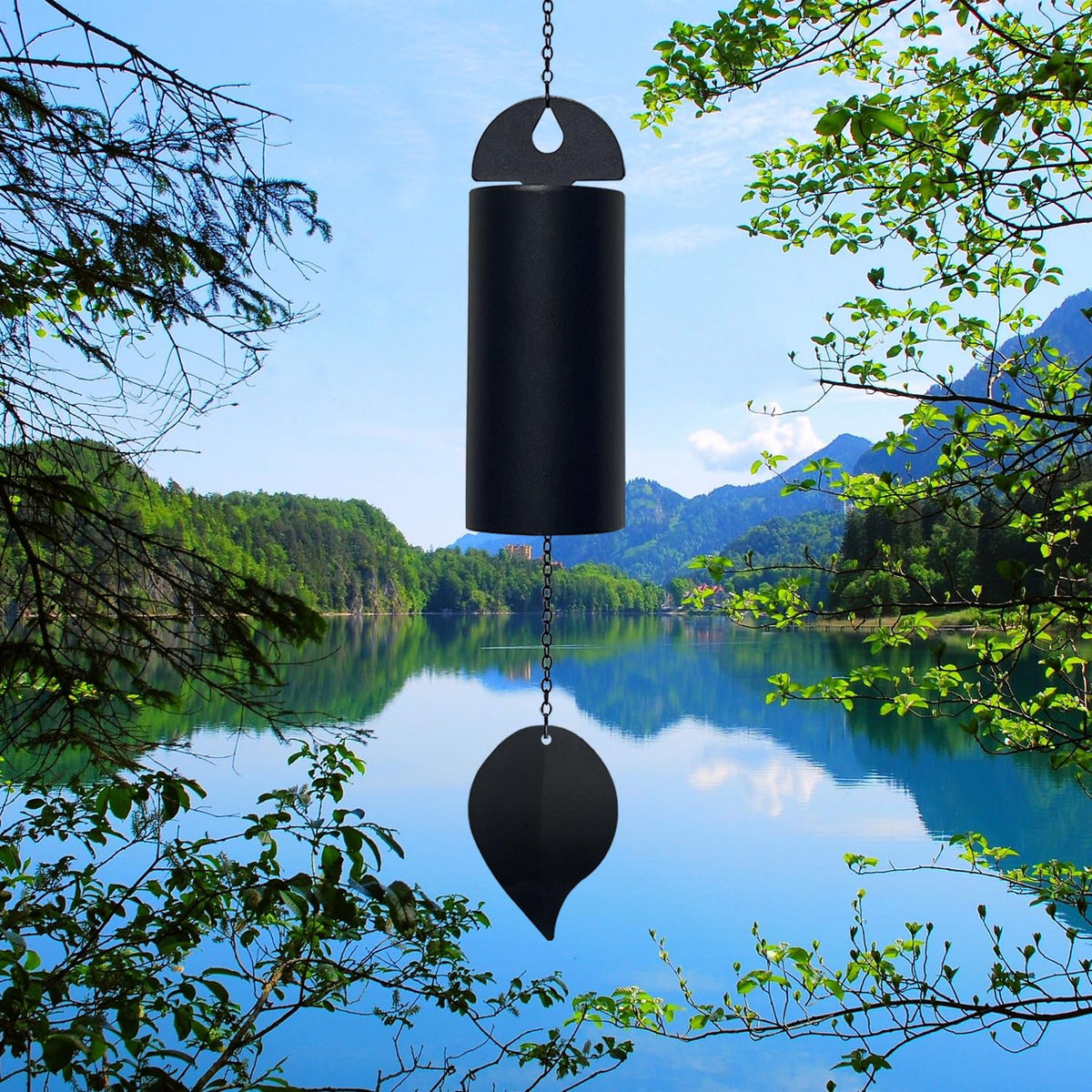 HDOOMN Deep Resonance Serenity Bell 30-inch chime outdoors for tranquil garden ambiance.
