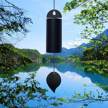 HDOOMN Deep Resonance Serenity Bell 30-inch chime outdoors for tranquil garden ambiance.