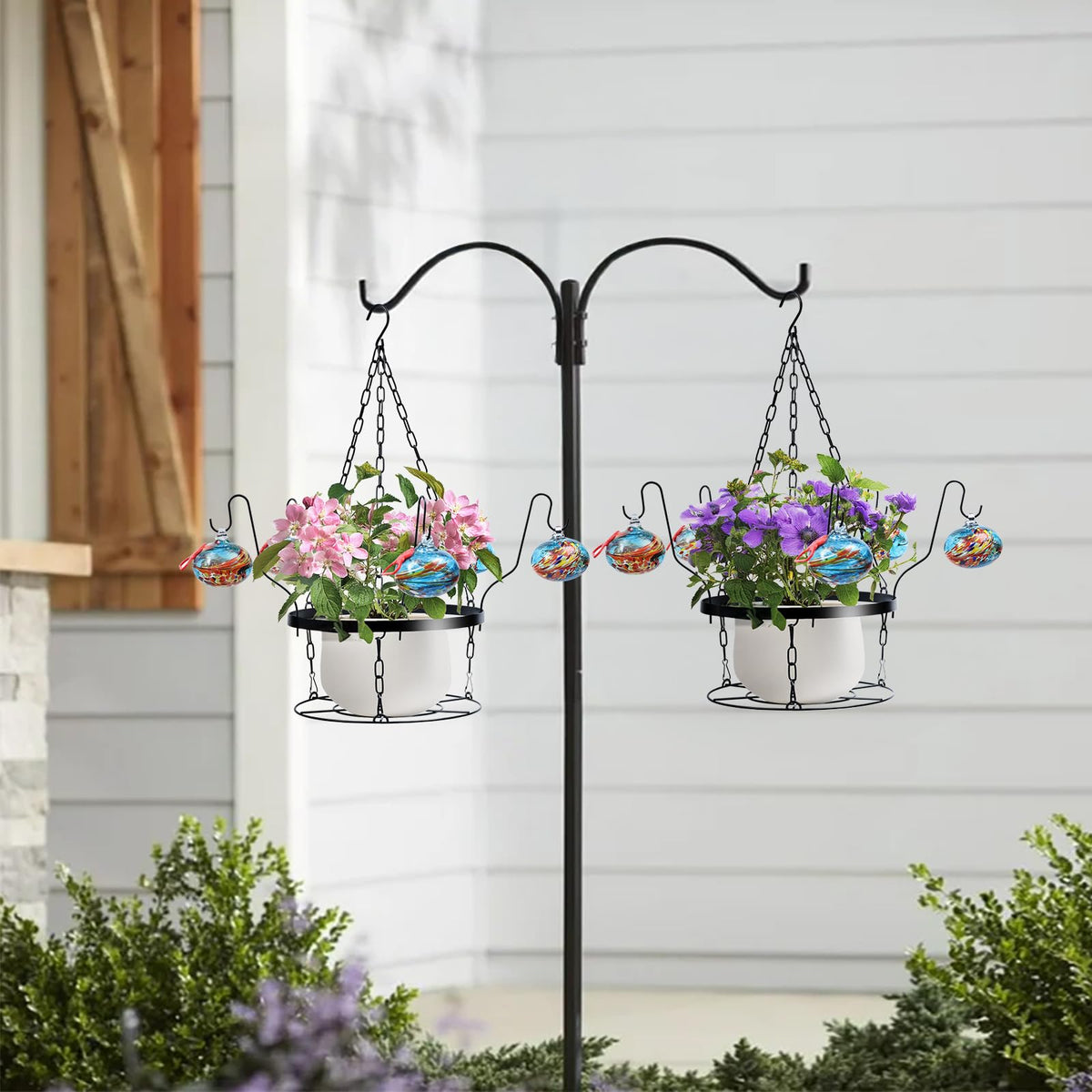 Headak Life glass hummingbird feeder balls attract birds with striking red accents.