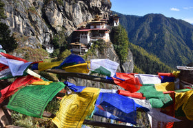 Healing Lama flag banner shown hung for outdoor display with fluttering movement.