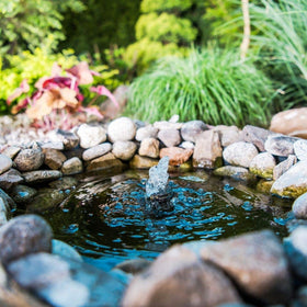 Healthy Ponds Blast water cleaner being poured for pond care.