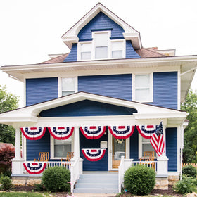 Heartome Memorial Day banner shown on a balcony with festive flair.