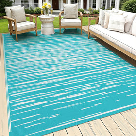 HEBE outdoor rug 5x8ft waterproof patio mat demonstrating all-weather durability and easy cleanup.
