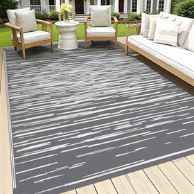 HEBE Outdoor Rug 5x8 waterproof on patio surface for easy cleanups
