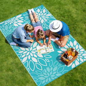 Floral design rug versatile for patios and multi-use spaces