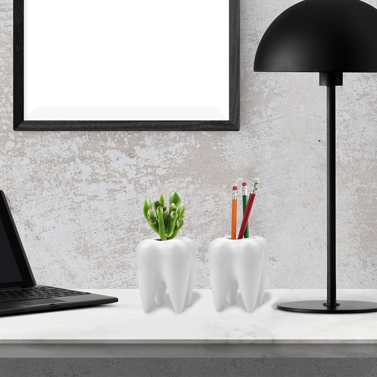 Hedume ceramic pots with tiny cacti adding whimsy to a desk