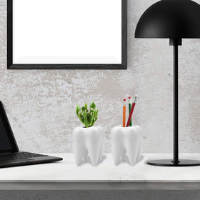 Hedume ceramic pots with tiny cacti adding whimsy to a desk