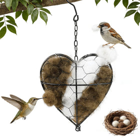 Hepanio heart-shaped alpaca nest hangs in a garden, ready for small birds