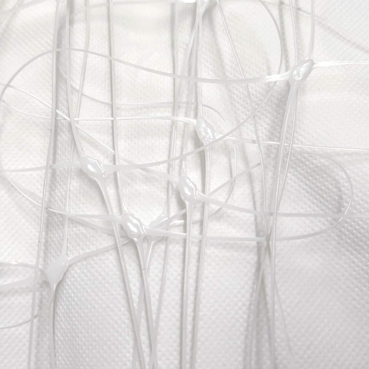 Rolled storage of HHTHH white trellis netting for easy deployment.
