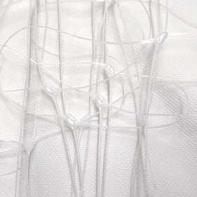 Rolled storage of HHTHH white trellis netting for easy deployment.