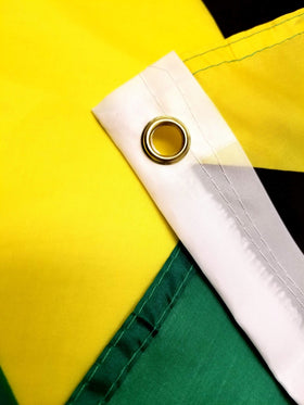 High Supply Jamaican flag displayed on a flagpole for bold visibility.