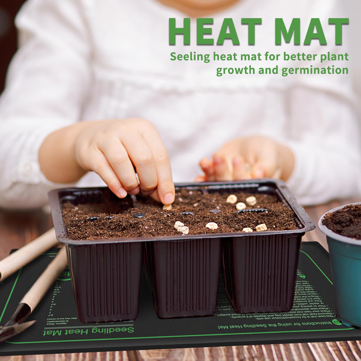 Higoro seedling heat mat with seed trays on the mat for uniform growth