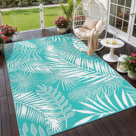HiiARug outdoor rug with palm leaf pattern, reversible design for versatile patio styling.