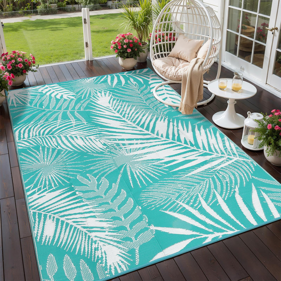 HiiARug outdoor rug with palm leaf pattern, reversible design for versatile patio styling.