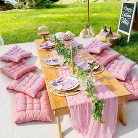 Hillsuren pink decor elements enhance wedding or birthday picnic ambiance.