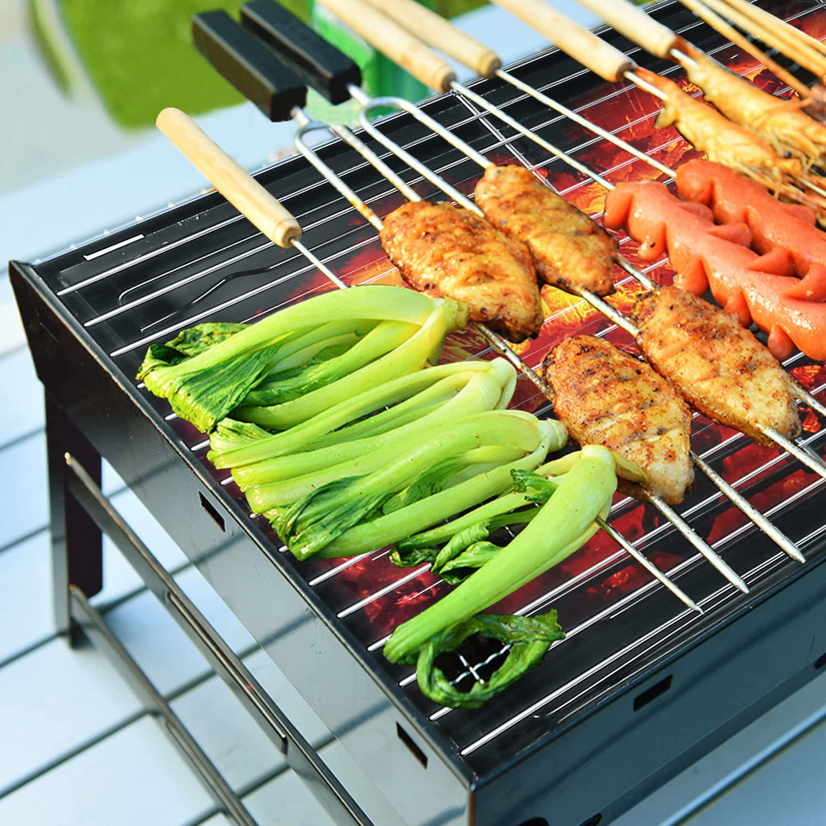 Himaly outdoor compact grill fits parks, beaches, and patios.