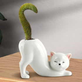 Glossy HKZTUY cat planter close-up highlighting smooth glaze and lines.