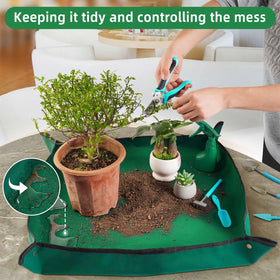 HNXTYAOB Portable potting tray catching soil and tools.