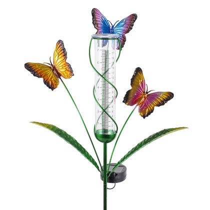 HOBYLUBY solar rain gauge with butterfly design lights up at night for garden ambiance