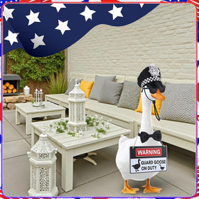 Hoemwarm police goose warning sign draws attention to yard themes.