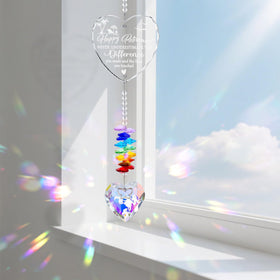 Hoemwarm crystal sun catcher creates vibrant rainbow reflections.