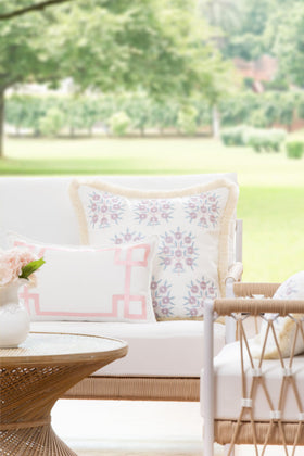 Hofdeco Premium blush pink Greek key embroidery enhances cozy indoor lounges beautifully.