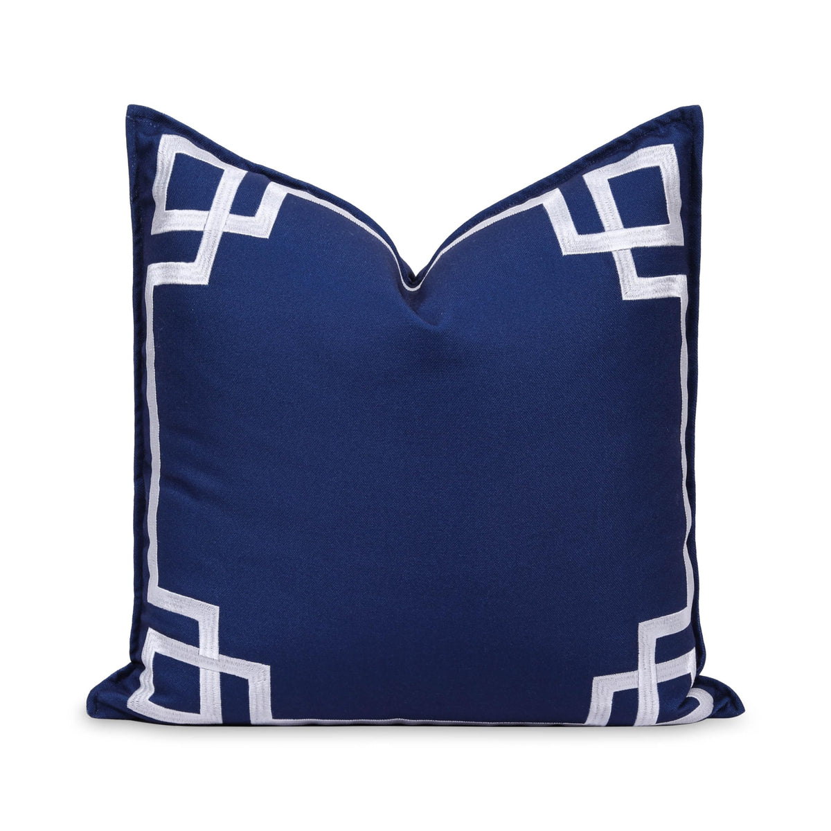 Hofdeco Premium coastal pillow cover with front embroidered Greek key, ideal for outdoor lounging and indoor seating.